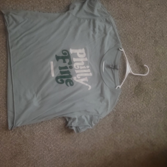 rally house Tops - Women's Graphic Muscle Tee in Light Blue